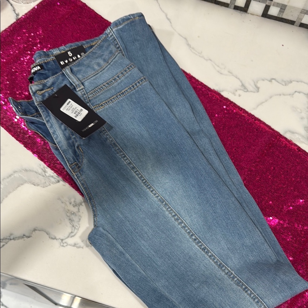 Fashion Nova Blue Skinny Jeans Sleek Fit Walk The Line Flare Jeans light blue